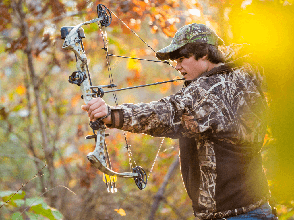 Bow hunting in the woods