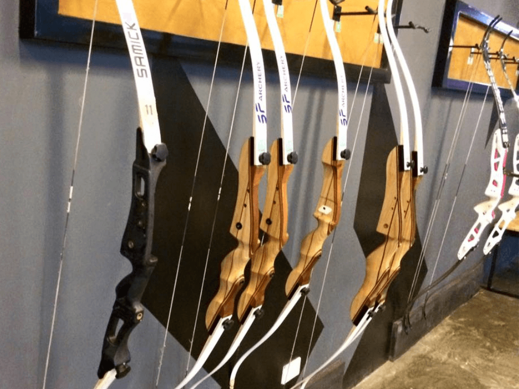 Rack of traditional longbows and short bows