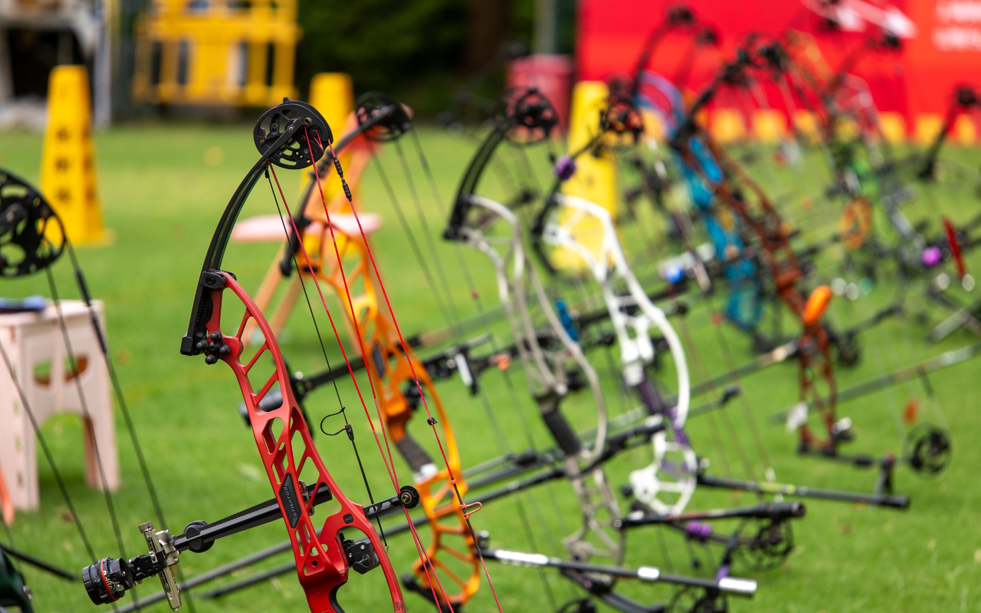Close-up of a compound bow cam and cable system